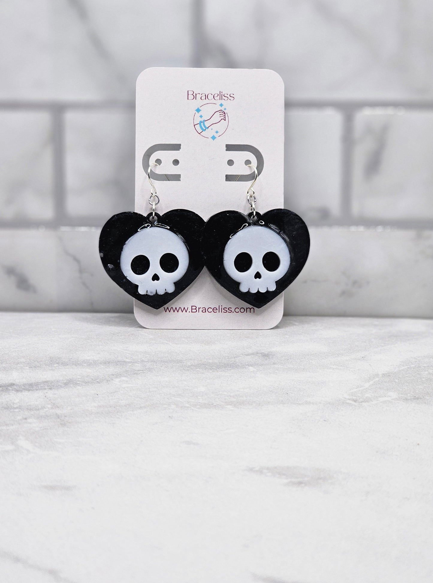 Holo skull heart earrings | pearl blk heart with white skull | braceliss
