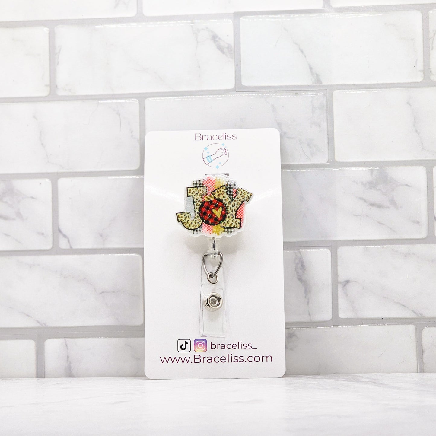 Joy retractable badge reel | holiday badge reels for nurses | Braceliss