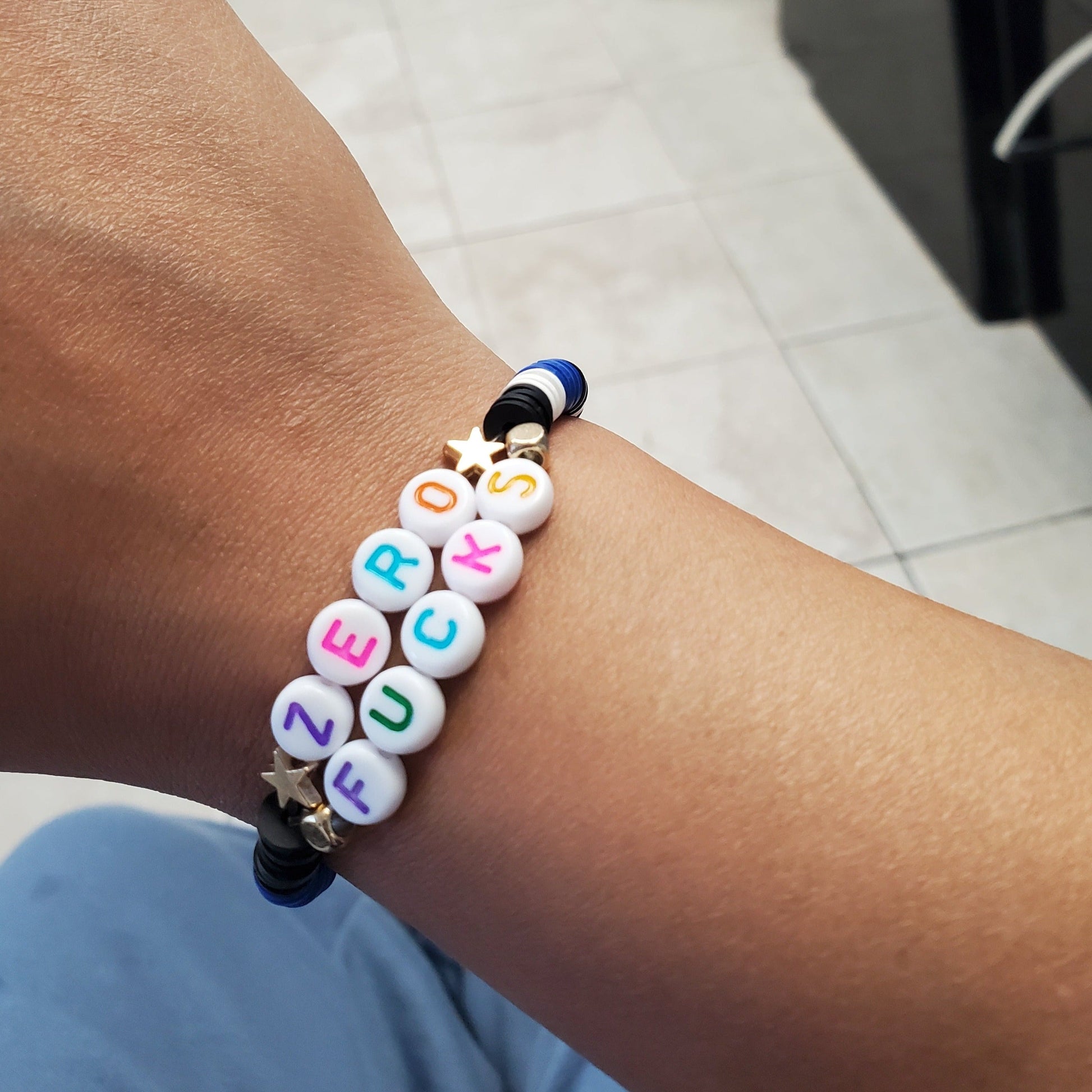 Woman wearing custom word bracelet - Braceliss