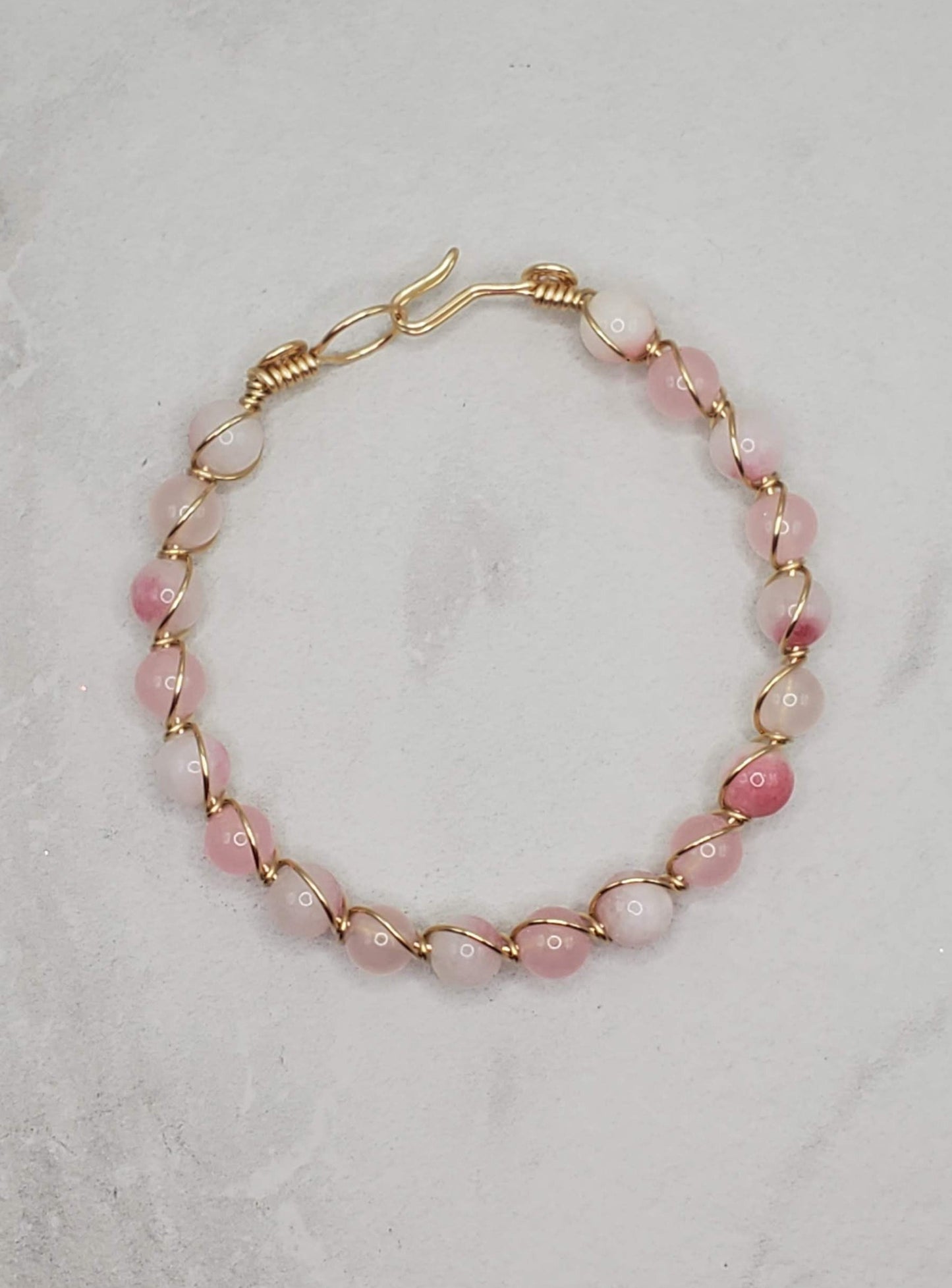 Pink gemstone bracelet | Gold bangle bracelet flatlay | Braceliss