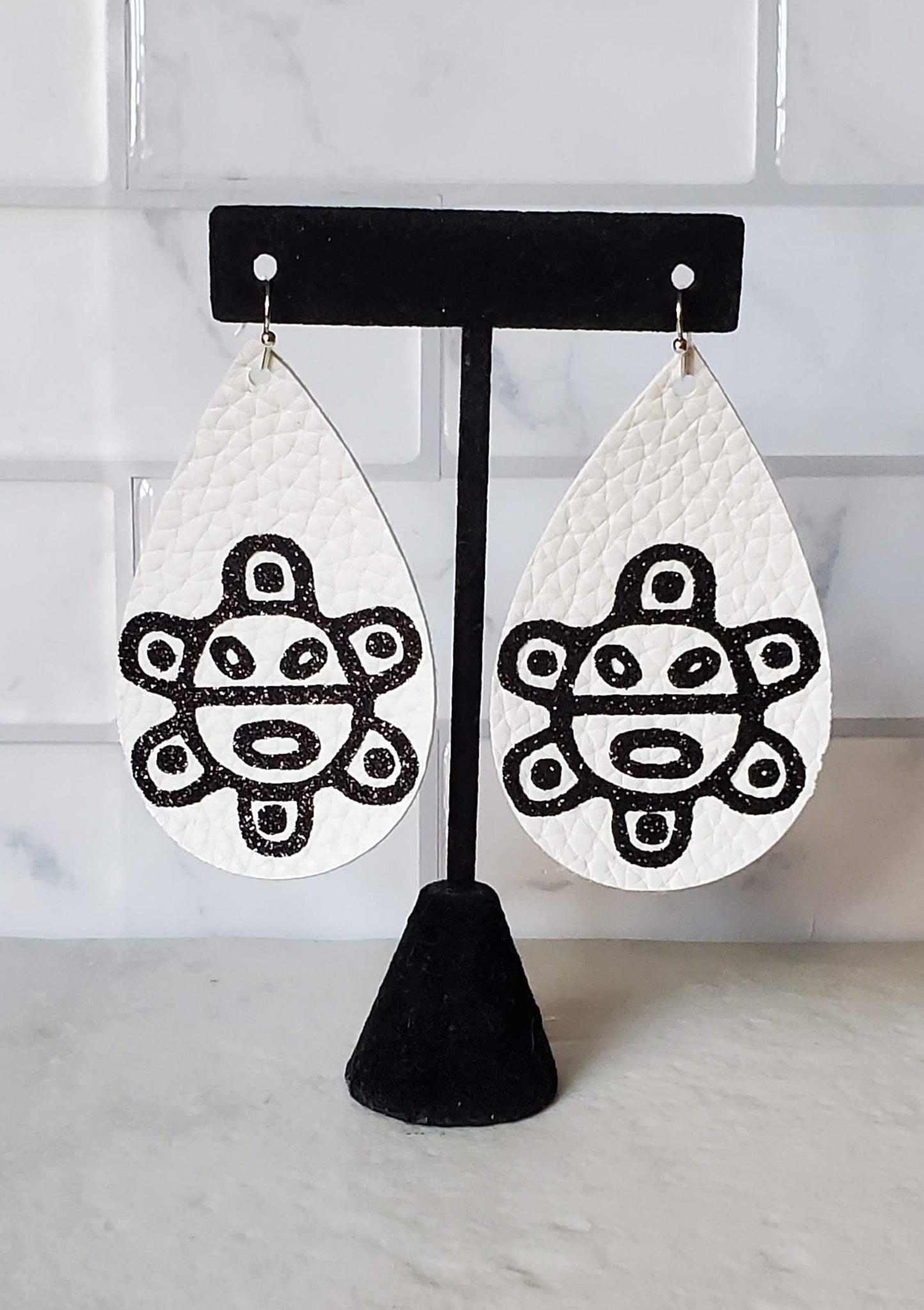 taino sol earrings - white faux leather teardrop earrings - braceliss