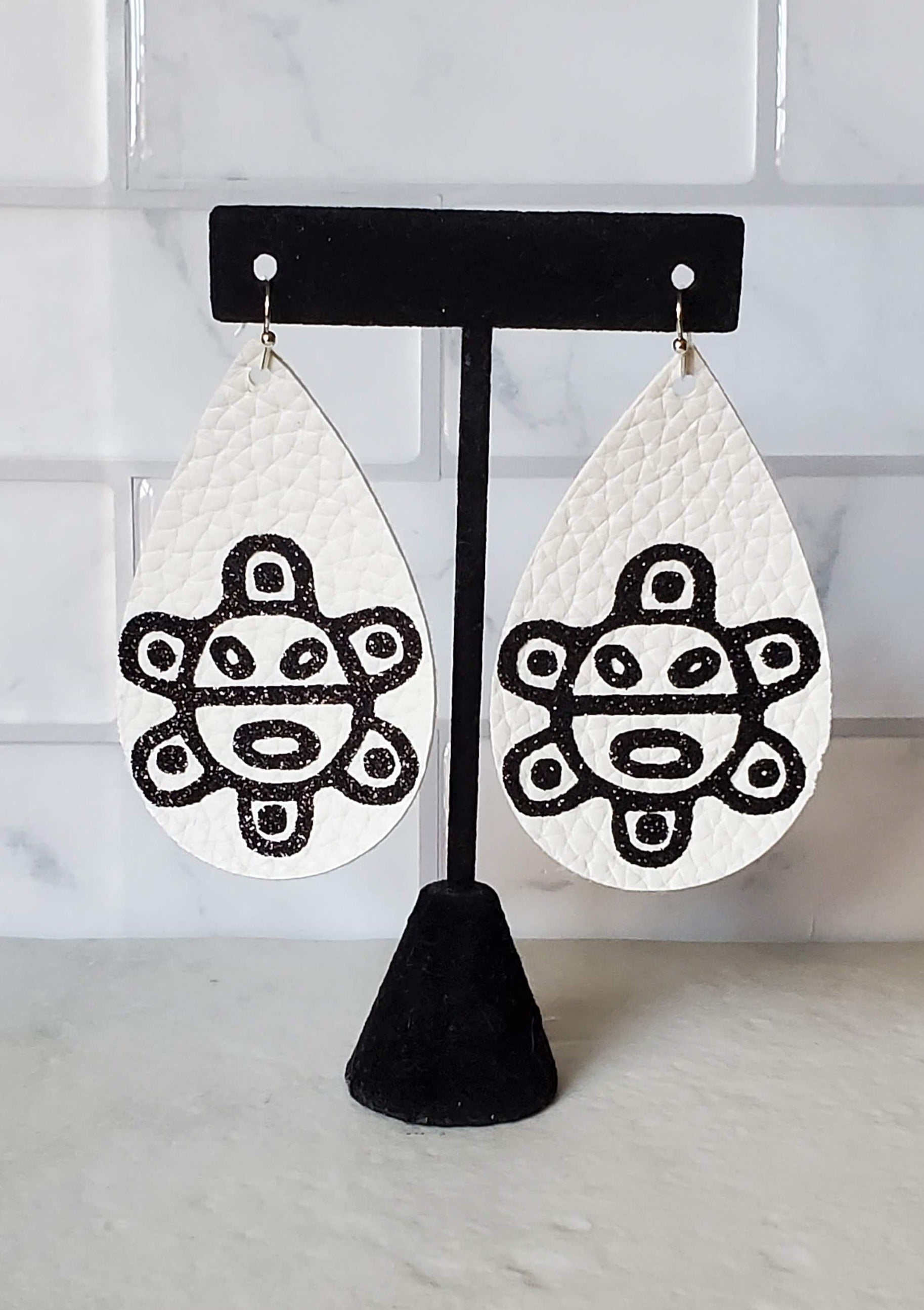 taino sol earrings - white faux leather teardrop earrings - braceliss