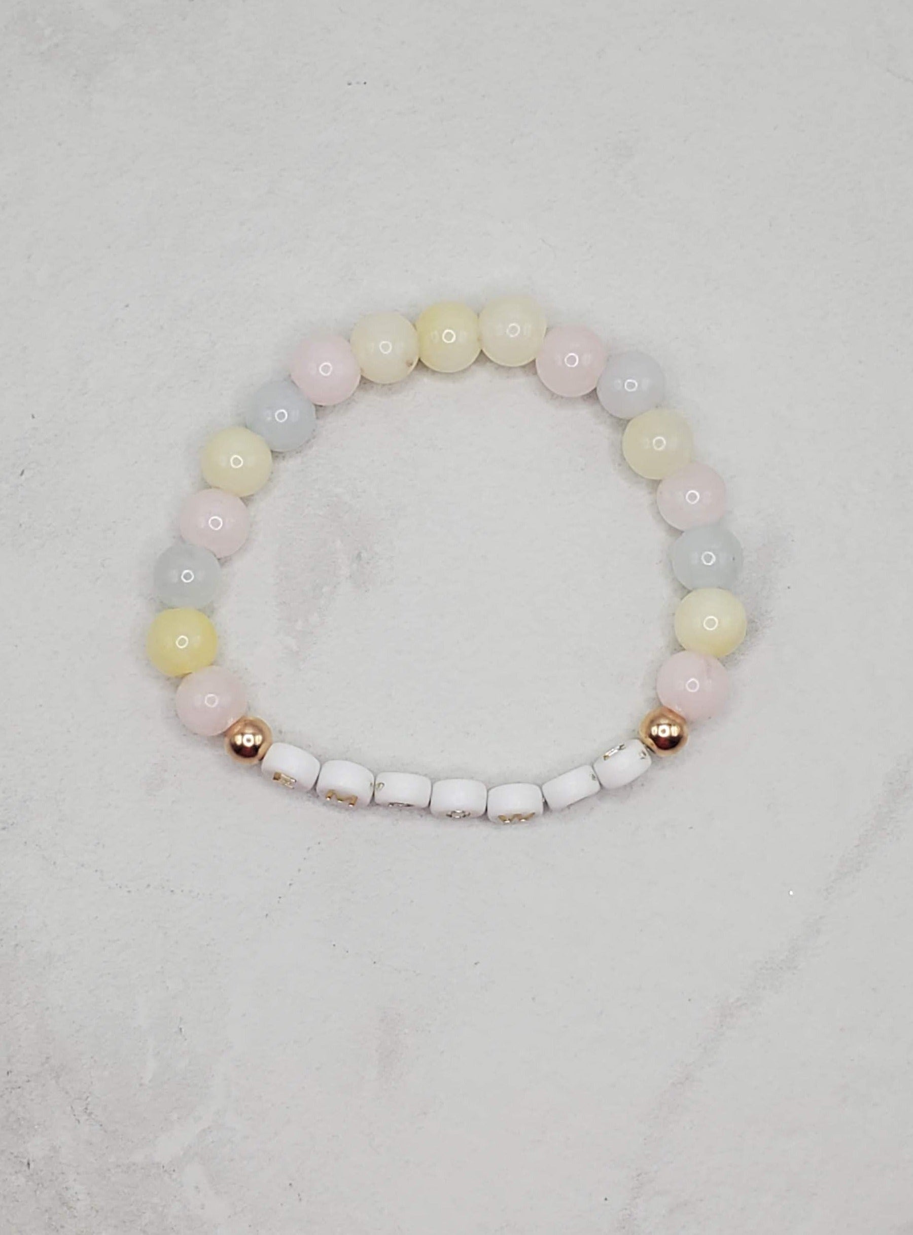 Empower beaded word bracelet | inspirational stretch bracelet flatlay | Braceliss