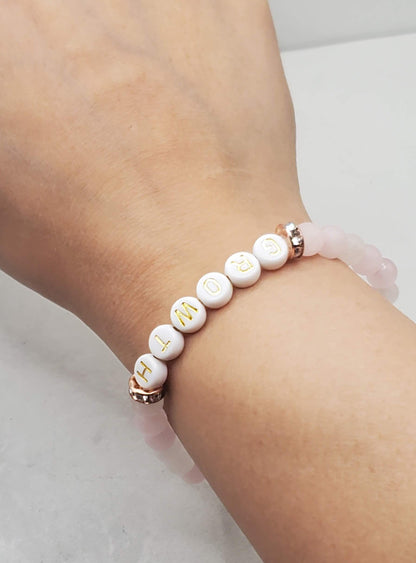 Growth beaded word bracelet | Inspirational stretch bracelet on a wrist | Braceliss