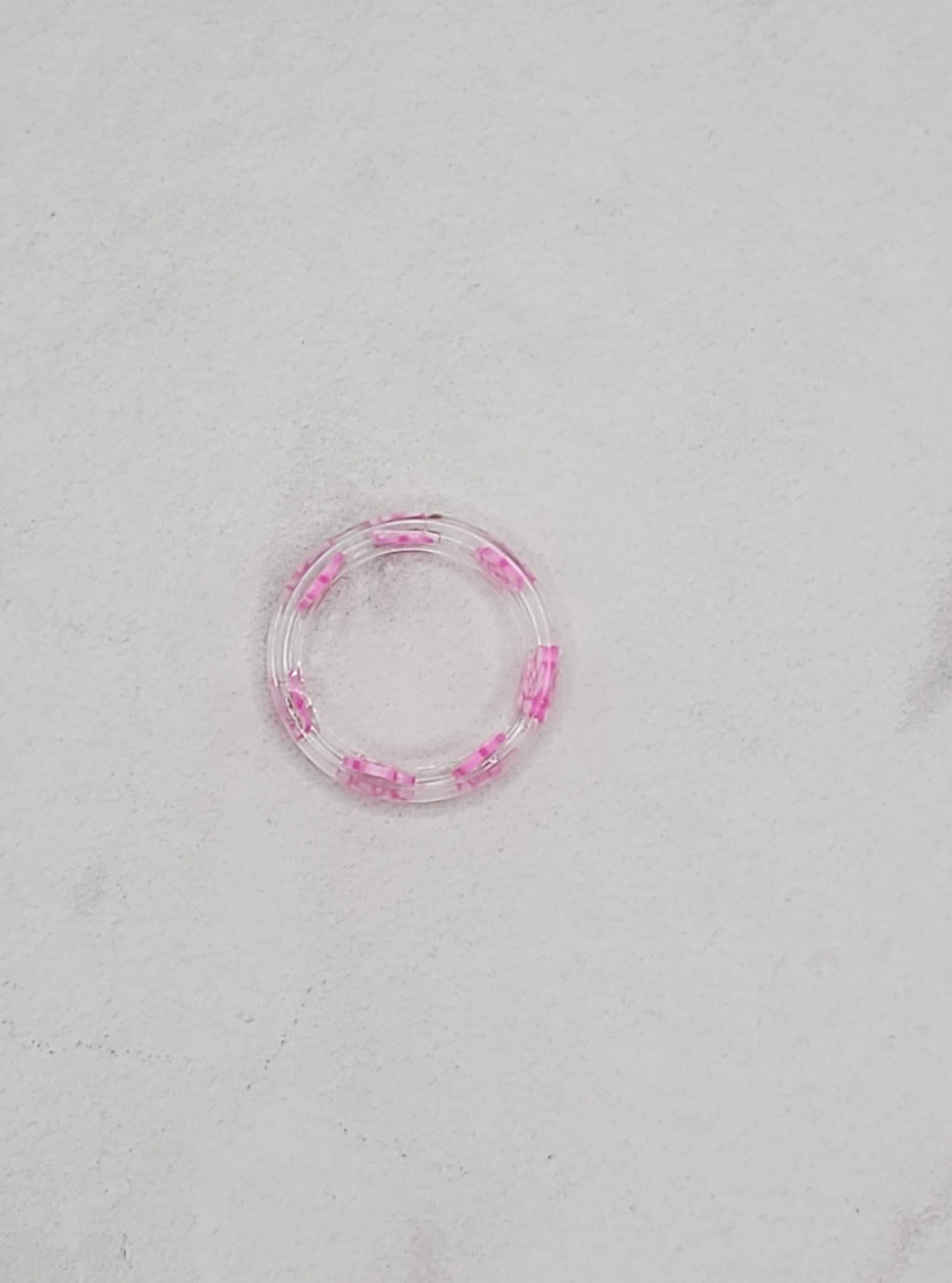 Rose Resin Ring Flatlay - Braceliss